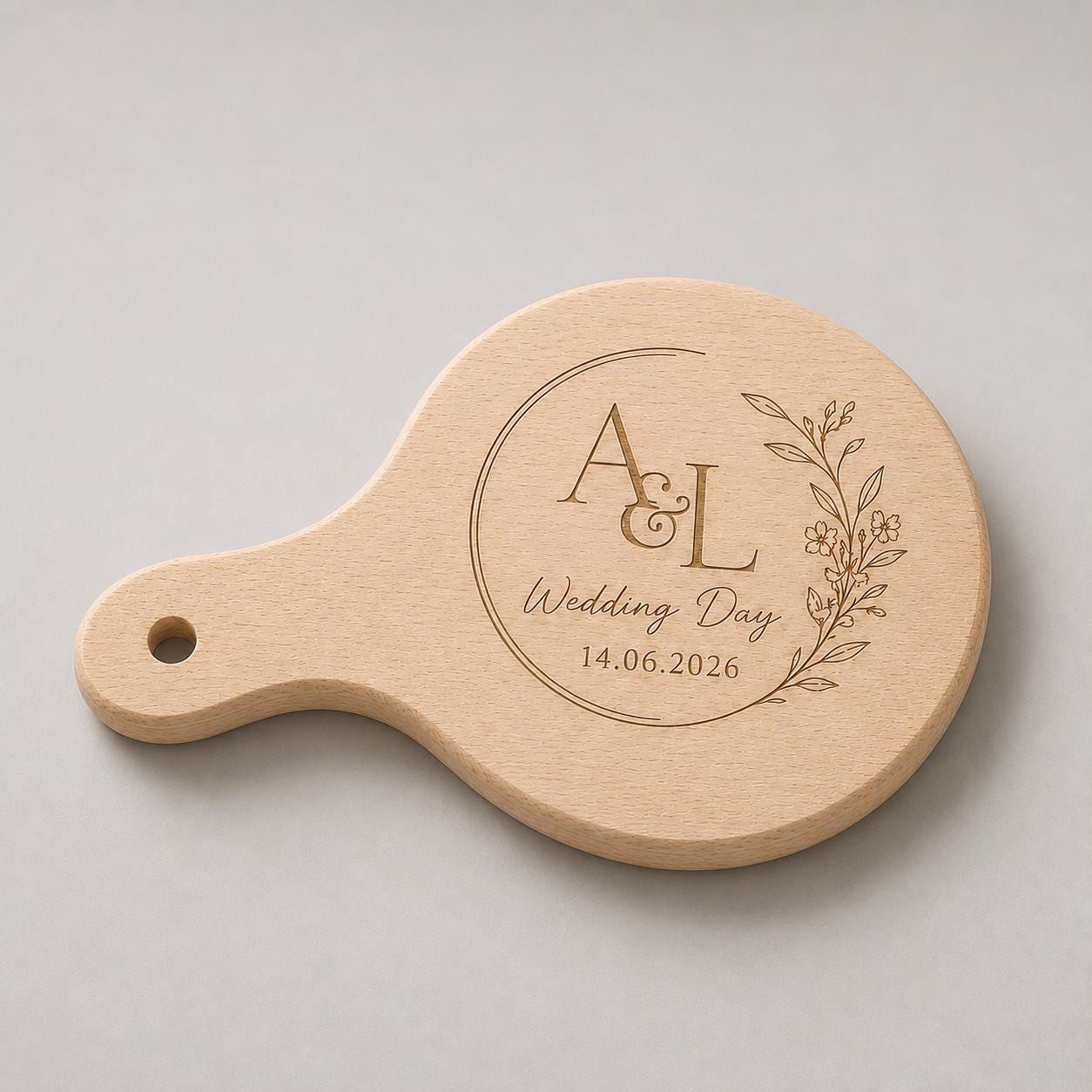 Venatura naturale del legno su mini tagliere rotondo